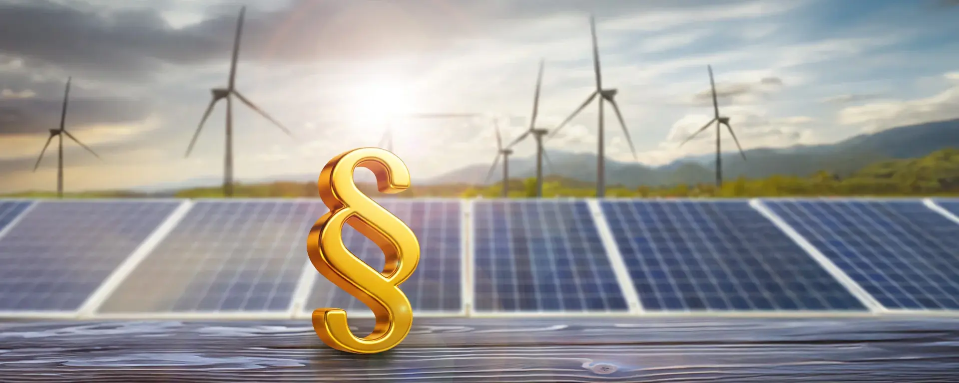 Energieeffizienzgesetz: Paragraphenzeichen, Solaranlagen und Windräder