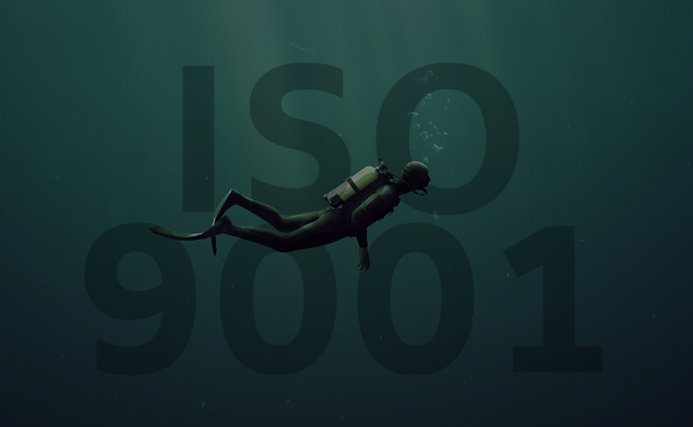 A diver in front of an ISO9001 lettering
